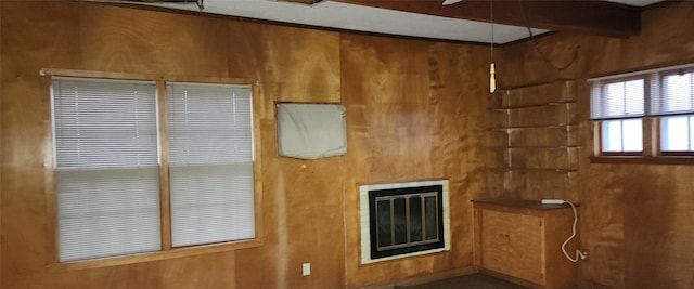 interior space featuring wood walls