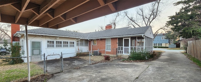 exterior space featuring cooling unit