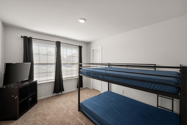 bedroom with light colored carpet