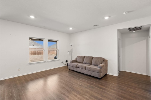 living room with dark wood-type flooring