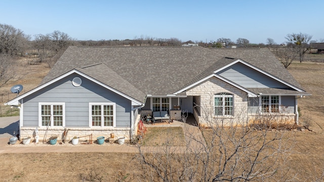 view of front of property with a patio