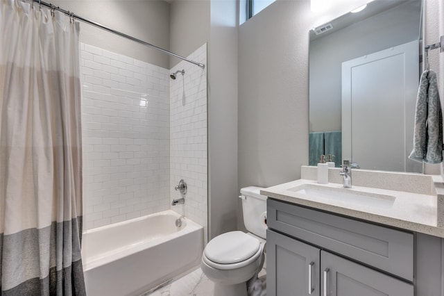 full bathroom with vanity, toilet, and shower / bath combo with shower curtain