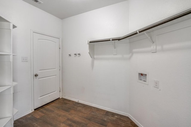 laundry room featuring washer hookup and dark hardwood / wood-style floors
