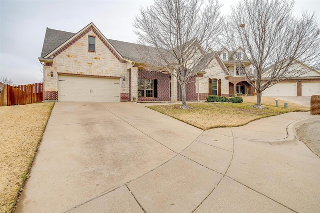 view of front of house featuring a garage and a front yard