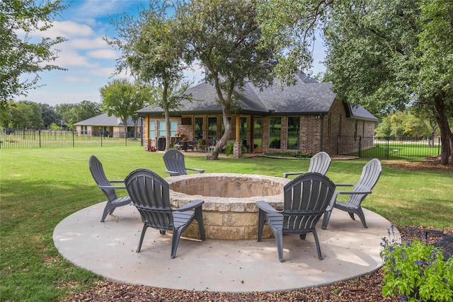 view of patio with a fire pit