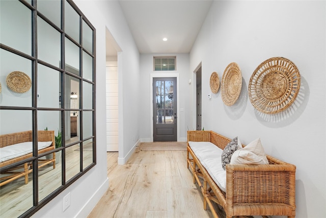 doorway to outside featuring light hardwood / wood-style floors