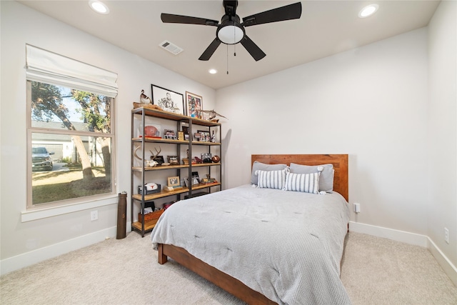 carpeted bedroom featuring ceiling fan