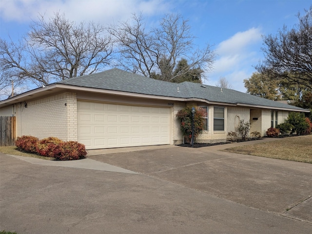 view of side of property with a garage