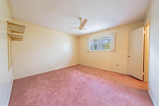 empty room with carpet floors and ceiling fan