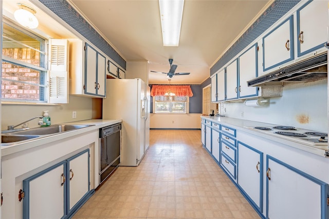 kitchen featuring under cabinet range hood, white appliances, white cabinets, light countertops, and hanging light fixtures