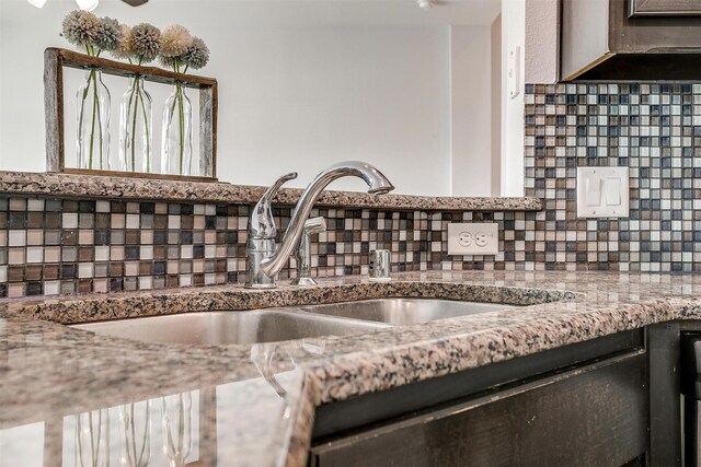 interior details with sink and backsplash