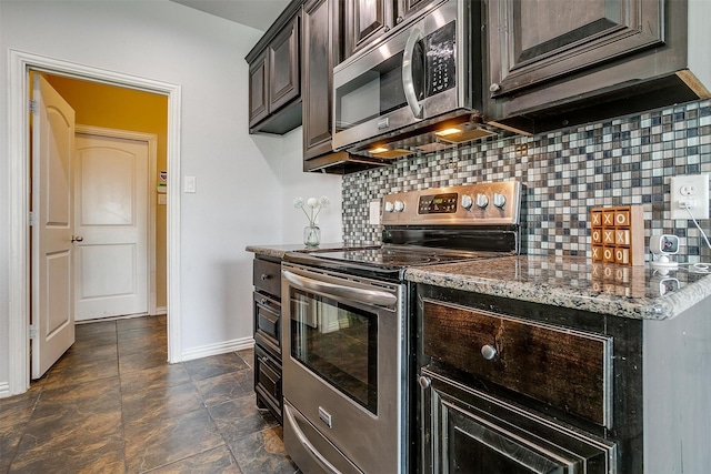 kitchen featuring stone counters, tasteful backsplash, appliances with stainless steel finishes, and dark brown cabinetry