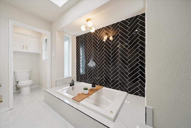 bathroom with a tub to relax in, toilet, and tile walls