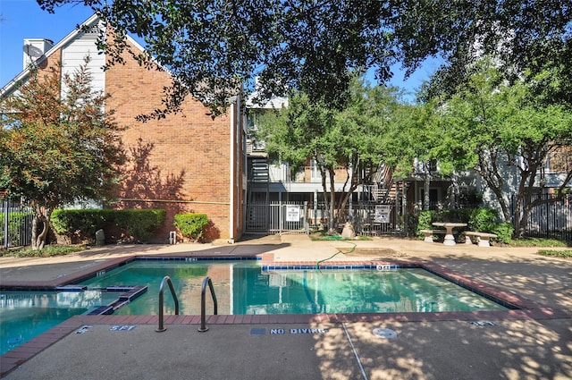 view of pool with a patio