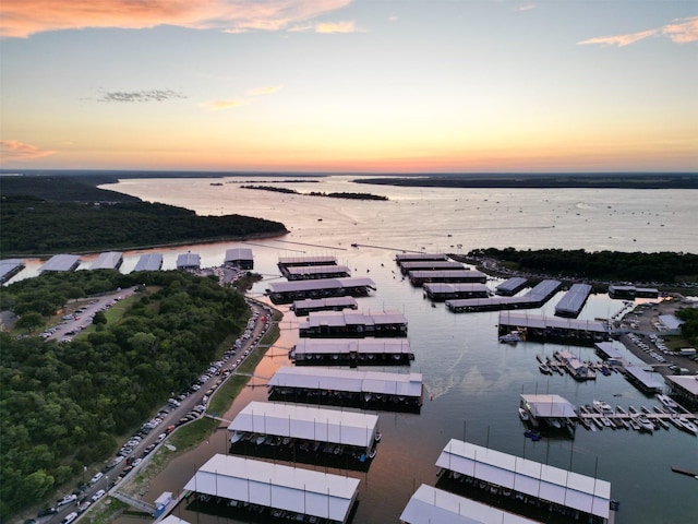 aerial view at dusk with a water view