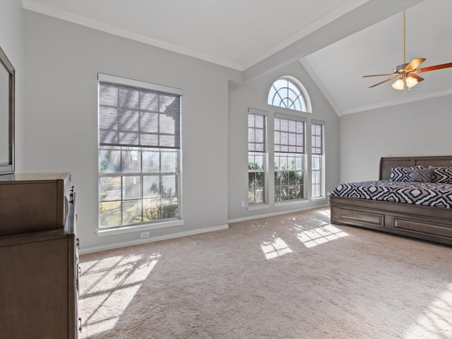 bedroom with crown molding, ceiling fan, lofted ceiling, and light carpet