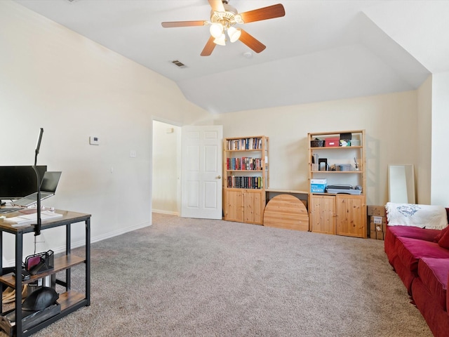 office featuring ceiling fan, carpet flooring, and vaulted ceiling