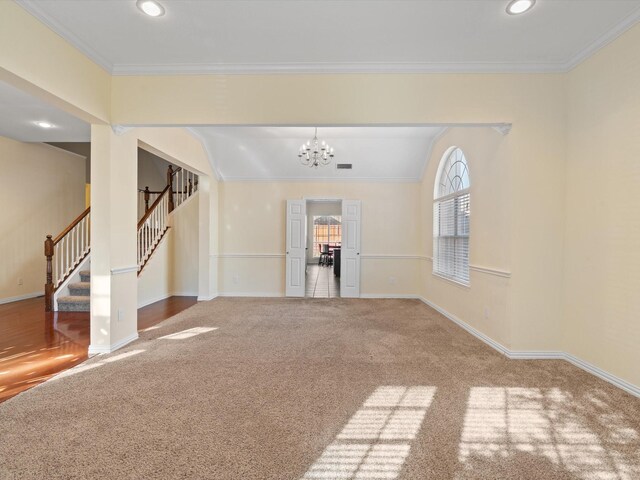 interior space with crown molding and a notable chandelier