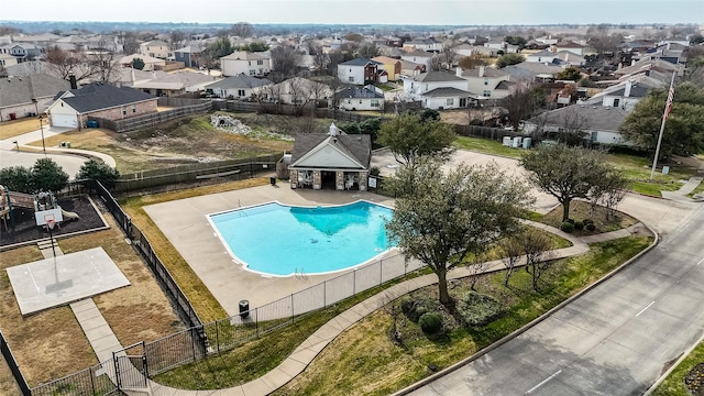 1415 Mallard Dr, Sherman, TX 75092 - community pool featuring a residential view and fence