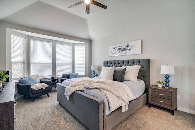 carpeted bedroom with lofted ceiling and ceiling fan