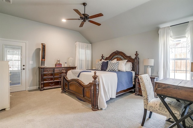 carpeted bedroom with ceiling fan and lofted ceiling