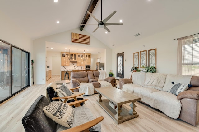 living room featuring beam ceiling, high vaulted ceiling, light hardwood / wood-style floors, and ceiling fan