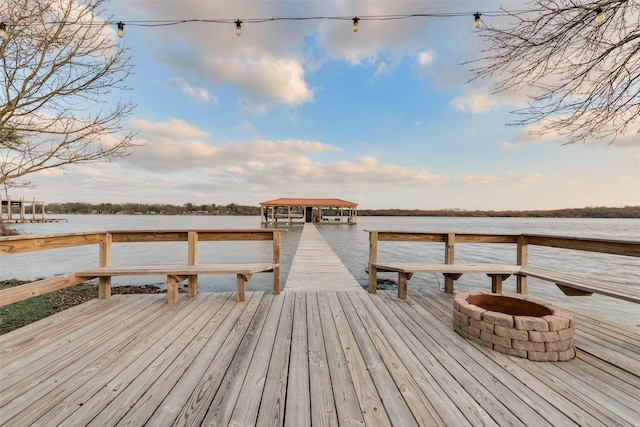 dock area featuring a water view