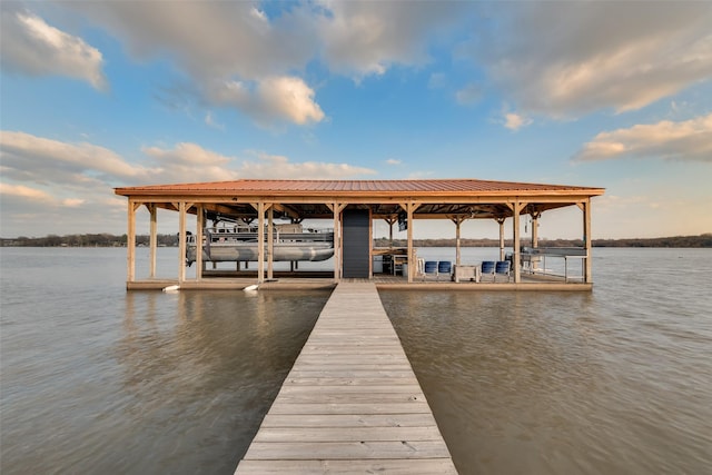 dock area featuring a water view