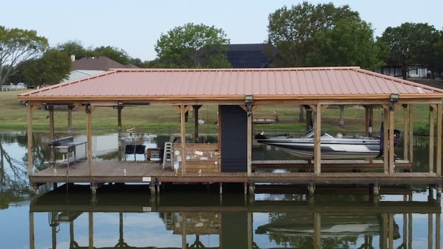 dock area featuring a water view