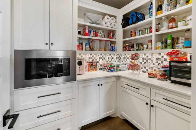 storage area featuring a toaster