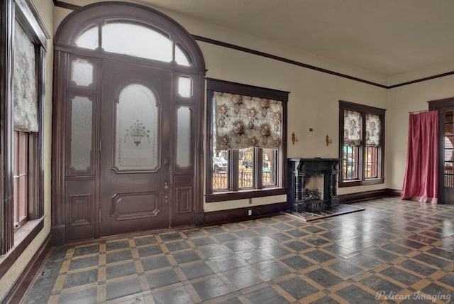 entrance foyer with a fireplace