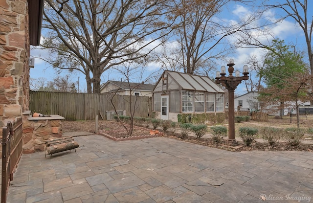 view of patio featuring an outdoor structure