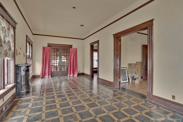 interior space featuring ornamental molding and french doors