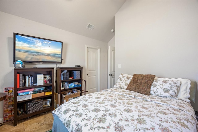 bedroom with lofted ceiling