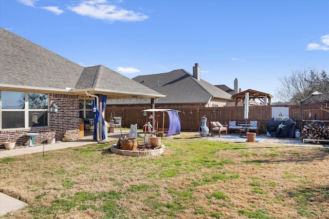 view of yard with a gazebo and a patio area