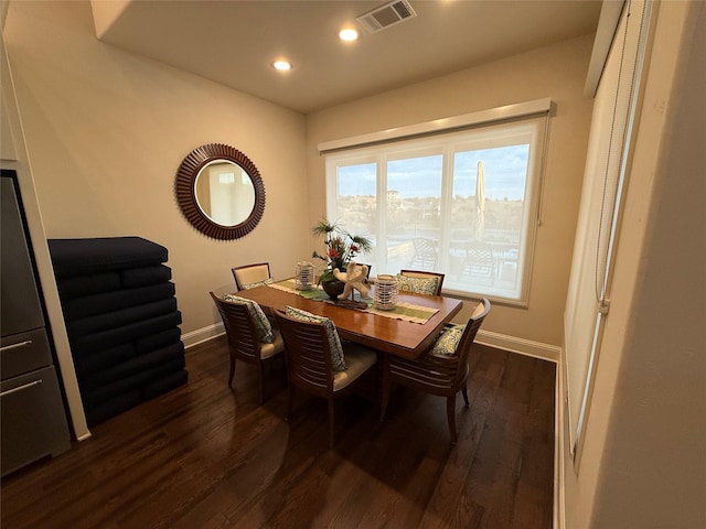 dining room featuring dark hardwood / wood-style floors