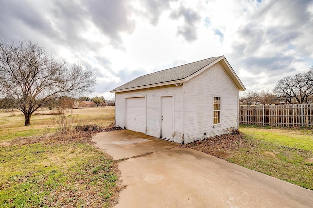 garage with a yard