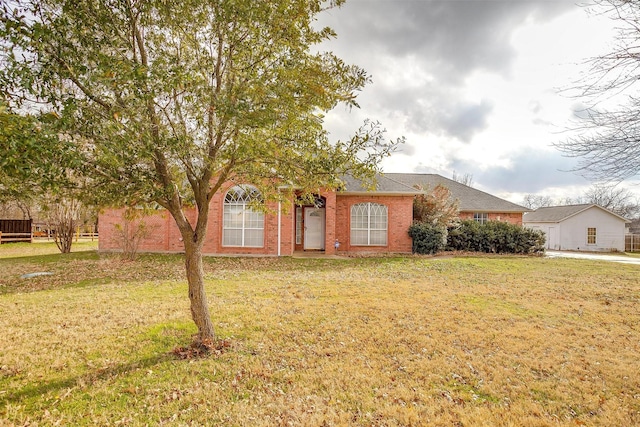 view of front of home with a front lawn