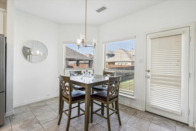 dining room featuring an inviting chandelier