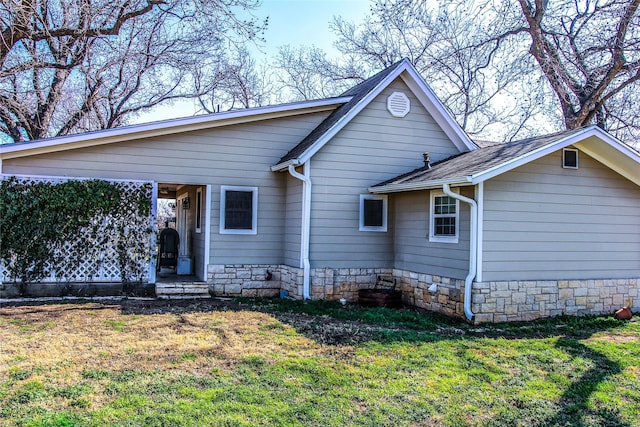 exterior space with a lawn