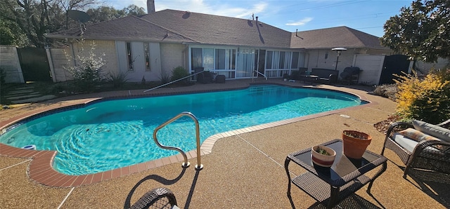 view of pool featuring a patio area