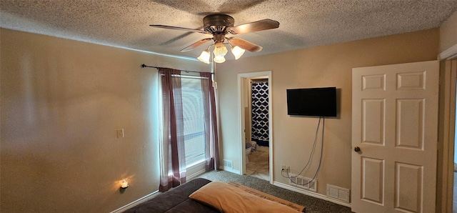 unfurnished bedroom with multiple windows, a closet, and a textured ceiling