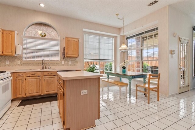 tiled living room with ceiling fan