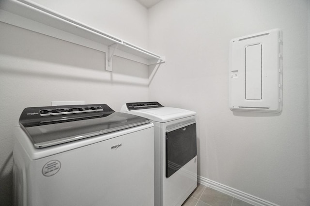 3244 Cross Shore Dr, Anna, TX 75409 - laundry room with laundry area, light tile patterned flooring, washing machine and dryer, and baseboards