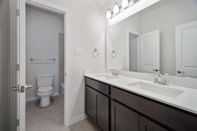 3244 Cross Shore Dr, Anna, TX 75409 - bathroom with a sink, toilet, double vanity, and tile patterned floors