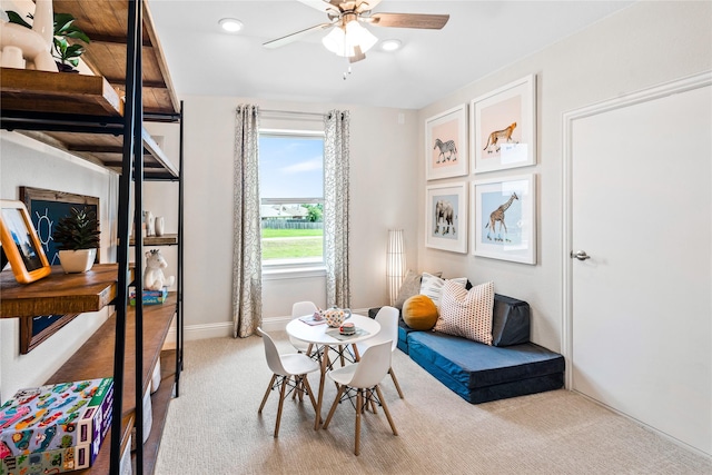 recreation room with ceiling fan and carpet floors