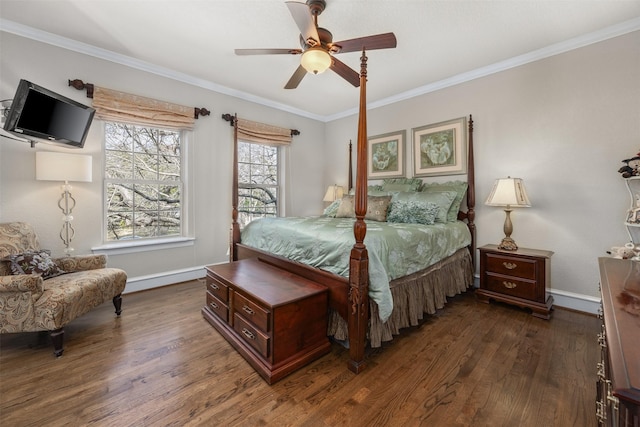 bedroom with crown molding, dark wood-type flooring, and ceiling fan