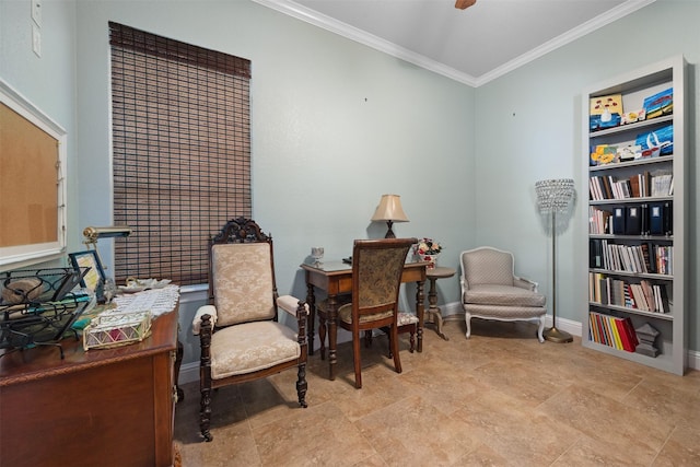 living area with ornamental molding and ceiling fan