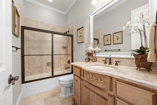 full bathroom featuring toilet, crown molding, vanity, enclosed tub / shower combo, and tile patterned flooring