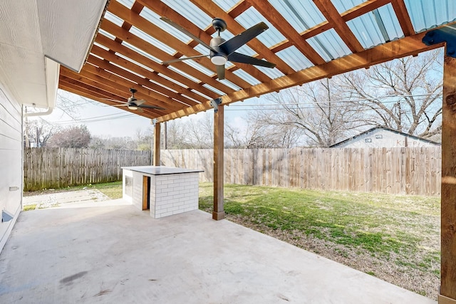 view of patio with ceiling fan